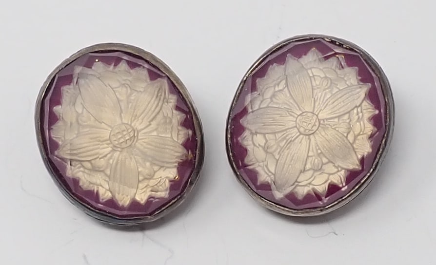 Stephen Dweck Earrings: Sterling clips with a reverse crystal intaglio floral design, 0.72 ozt.