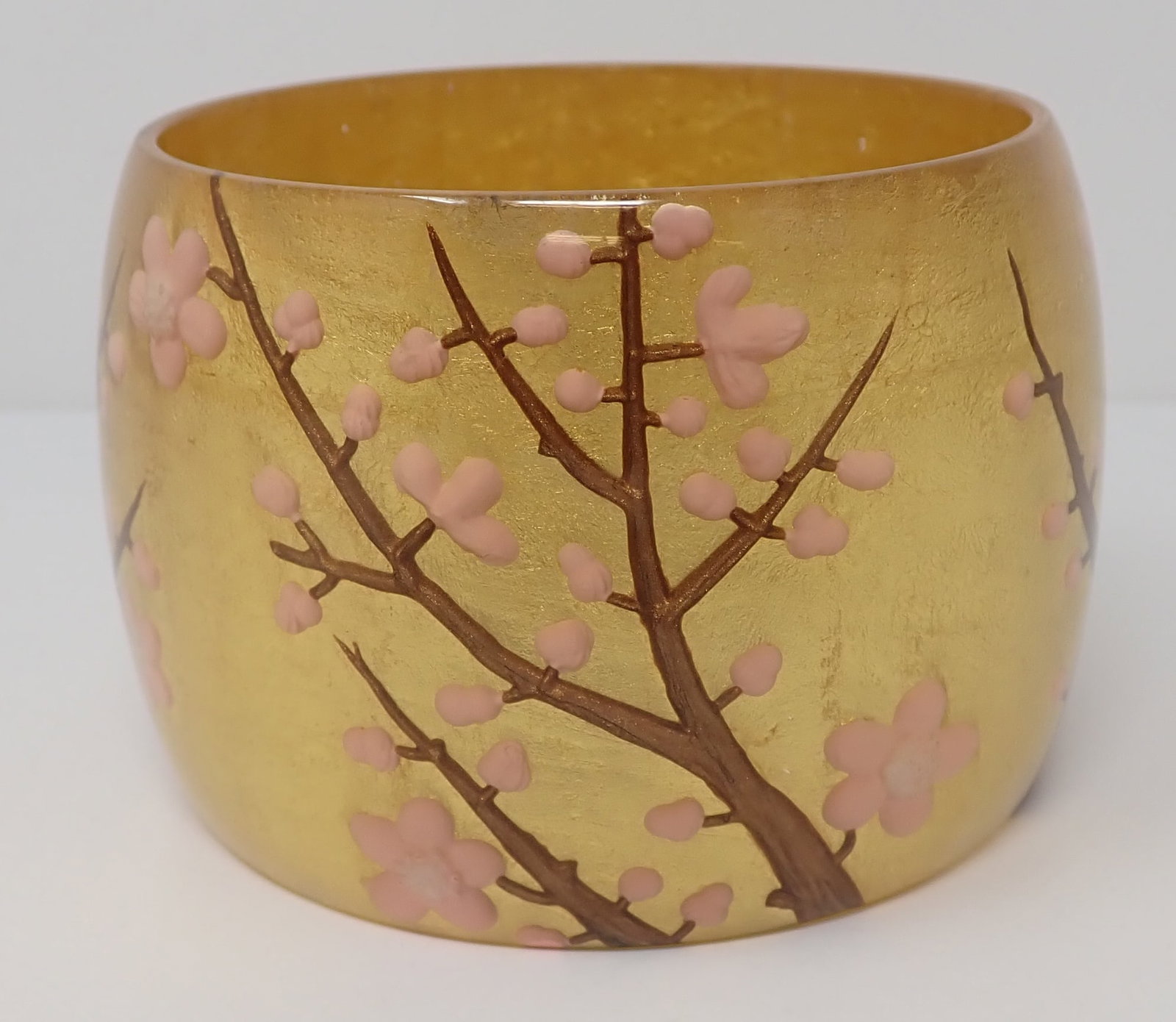 Zsiska Hanami Bracelet: 2" wide, gold color with branches of pink flowers