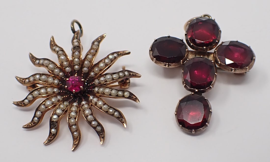 2 Antique Pin-Pendants: Includes a 10K yellow gold starburst with seed pearls and center ruby; along with a 10K yellow gold cross containing 5 oval cut garnets, 6.36 dwt total.