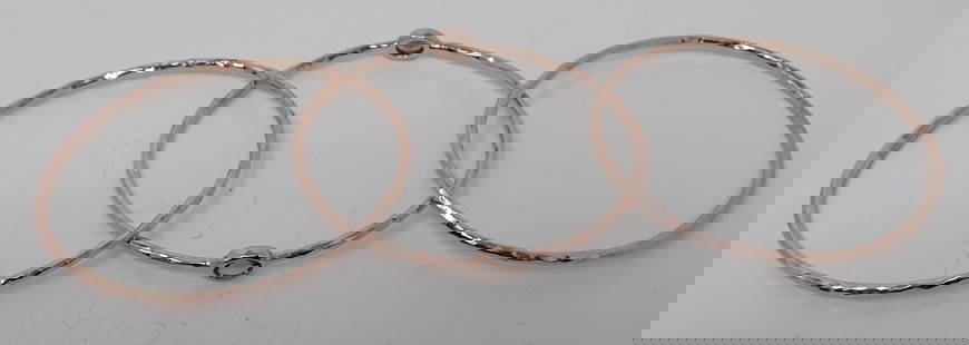 Ippolita Rose Bangle Bracelet Set of 3: Sterling with rose gold-tone finish, oval bangles with one containing two oval cut quartz of complimenting color, 0.86 ozt total.