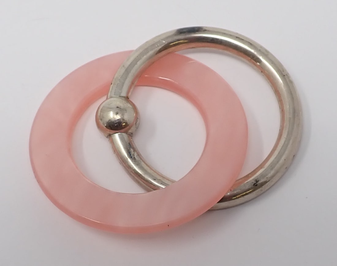 Baby Rattle: Sterling and pink Lucite rings. 0.76 ozt.