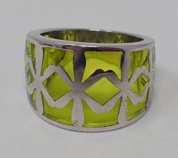 Angelique de Paris Ring: Tapered form with green glass, silver overlay and band, ring size 8, 0.27 ozt.