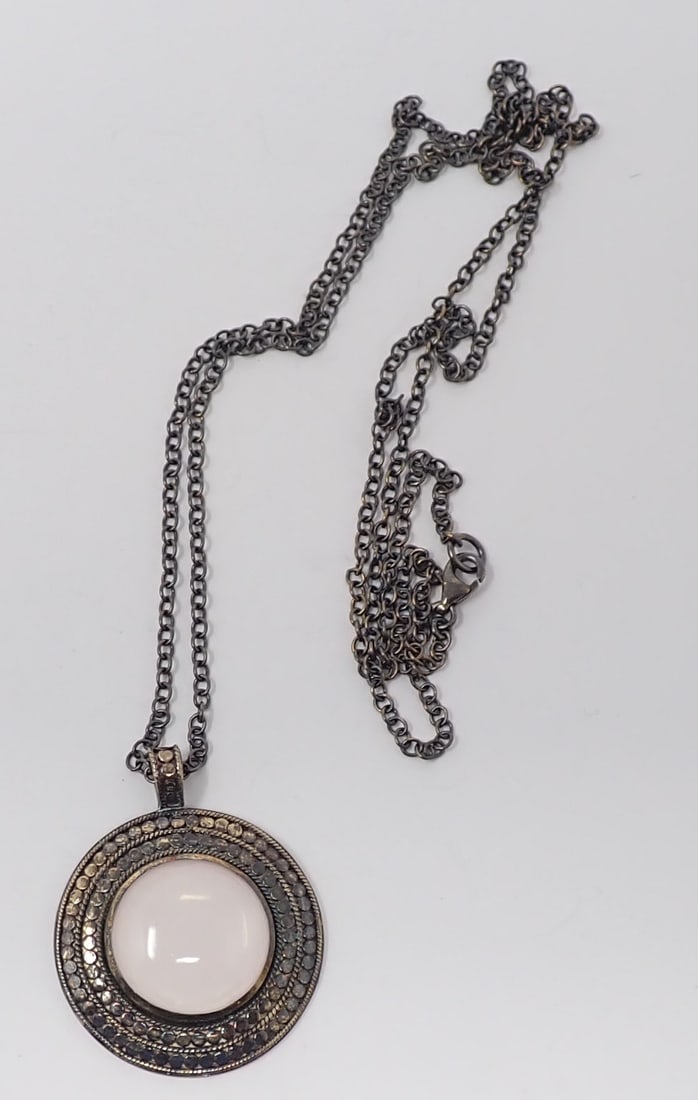 Anna Beck Sterling Pendant on Chain: Sterling 30" rolo link chain, Pendant with pink glass center cabochon surrounded by dots, approx. 1.5" diameter, 0.62 ozt.