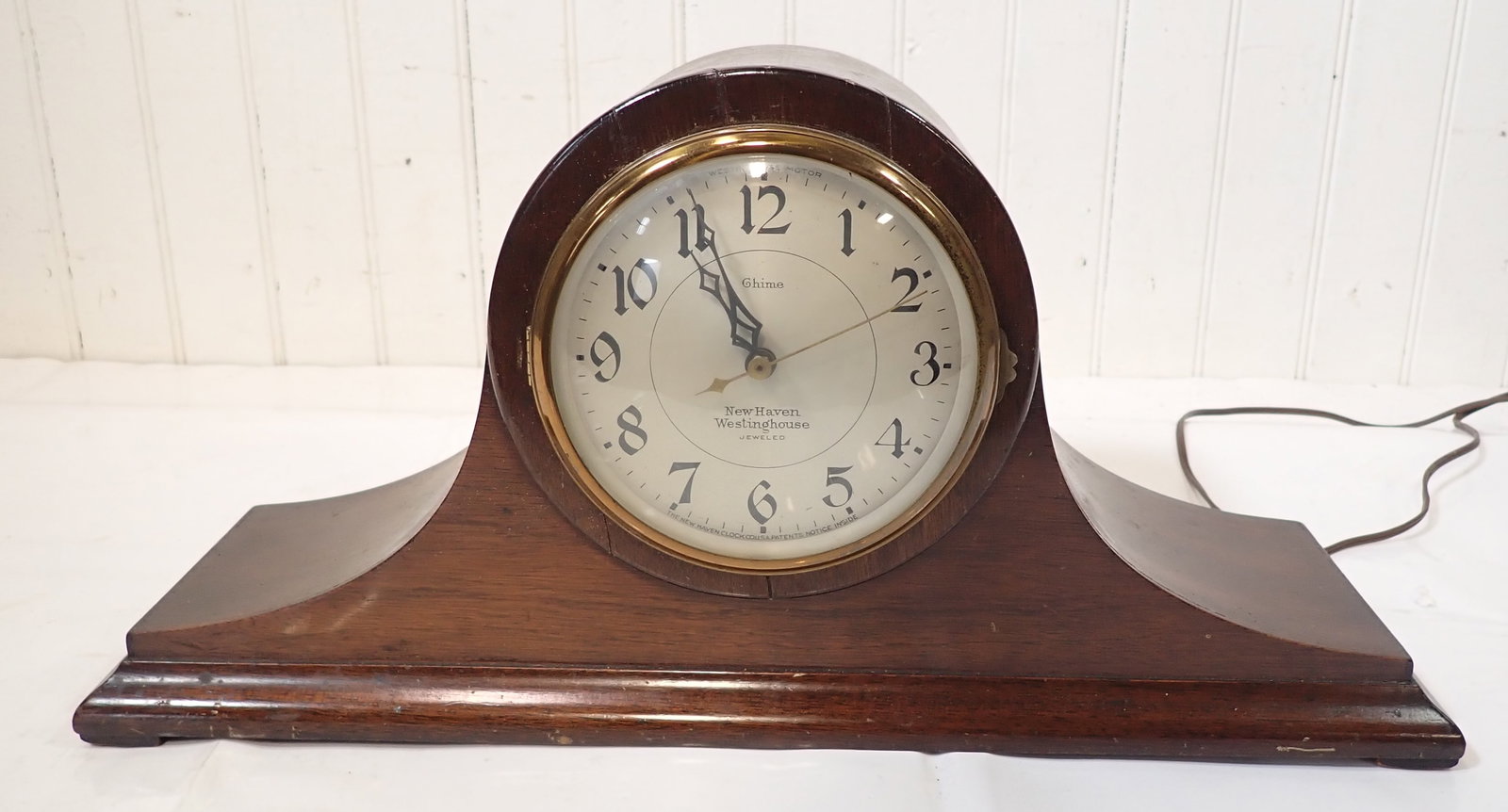 New Haven Cavalier Electric Clock: Approx 5 1/4" x 18 3/4" x 9" tall. Shipping available