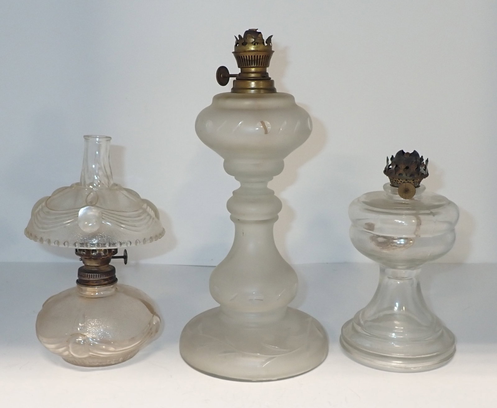 3 Miniature Oil Lamps: Tallest is approx 9 3/4". Shipping available