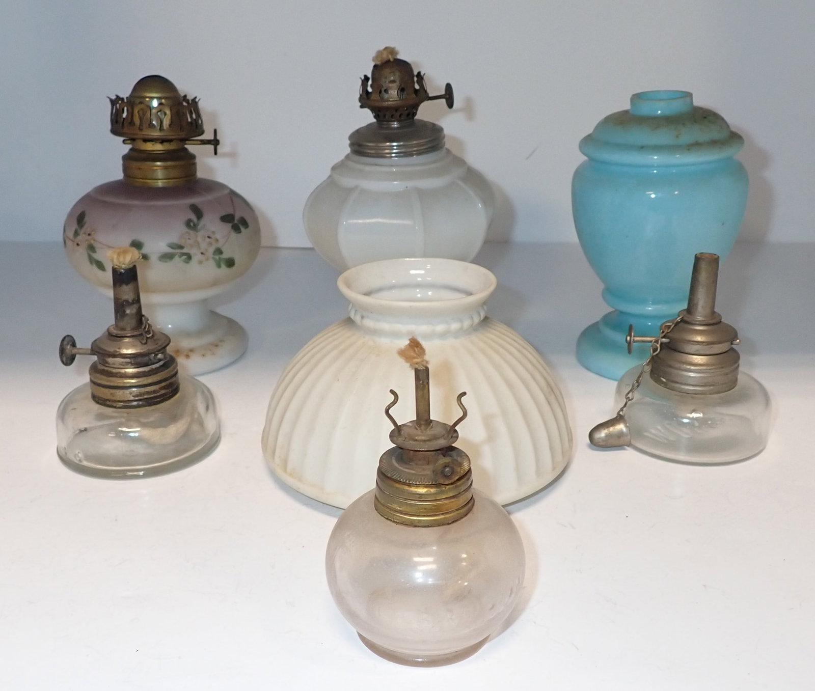 Miniature Oil Lamps: Tallest is approx 6 1/8" tall. Shipping available ($20 handling charge)