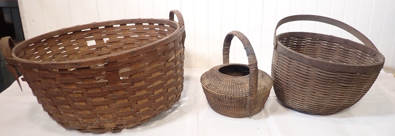 Baskets: Largest is apprx 22" in diameter and 11 1/2" tall. No in house shipping !