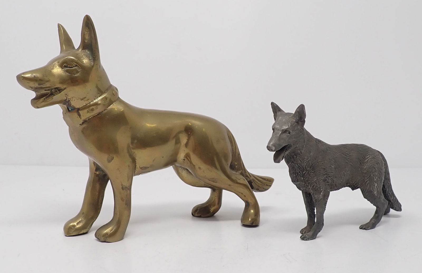 Brass & Pewter German Shepherd Dogs: Largest is apprx 6 1/2" long and 5 3/8" tall. Shipping available