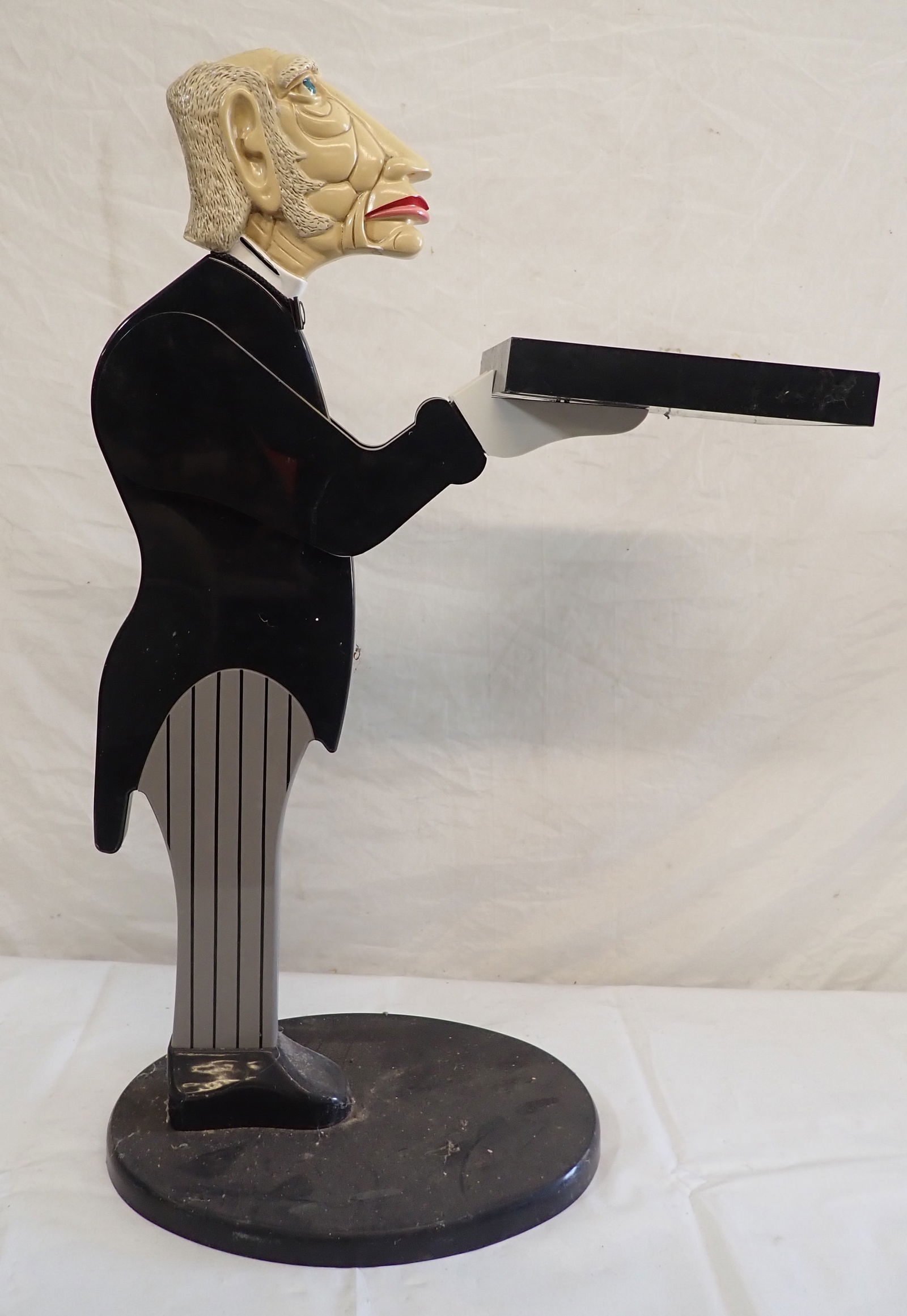 Butler Cardholder: Plastic Butler is approx 32 1/2" tall. No in house shipping !