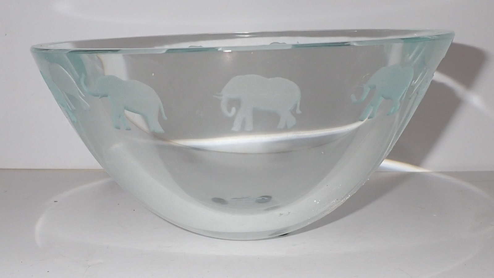 1996 Schlaum Bowl w/ Elephants: Approx 7 3/8" in diameter and 3 3/4" tall. Shipping available