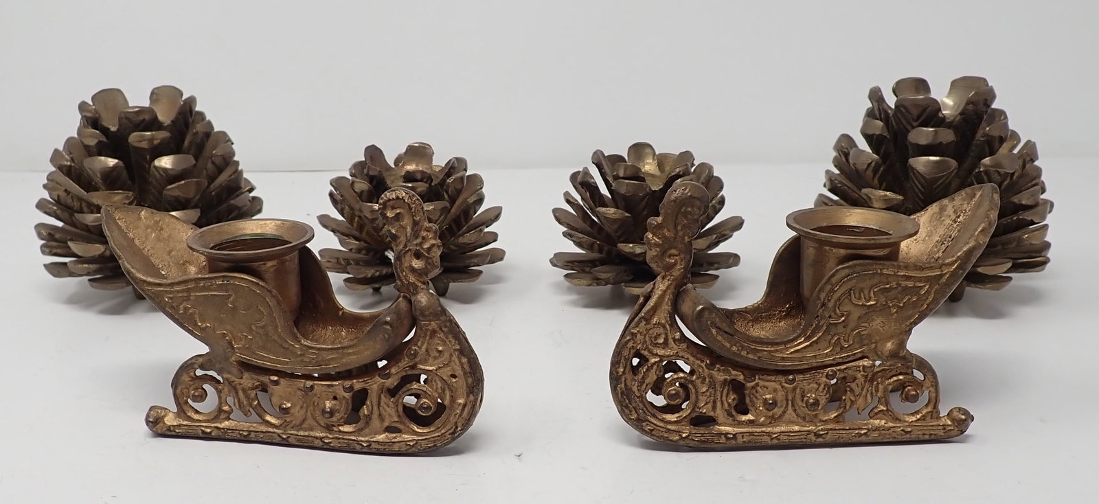 Brass Pinecones & Sleigh Candleholders: Sleighs are approx 4 1/4" long and 2 1/2" tall. Shipping available