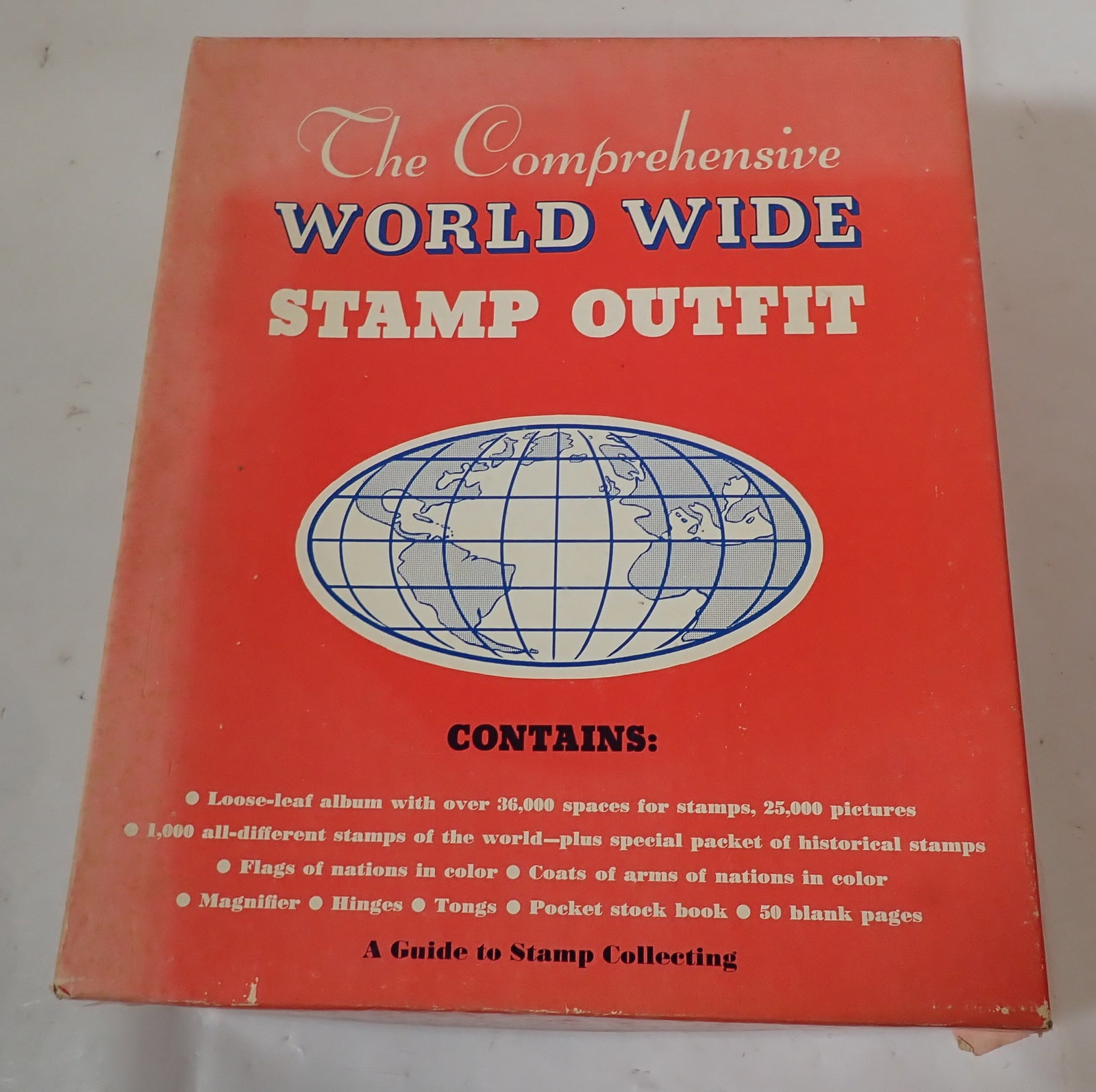 Comprehensive World Wide Stamp Outfit: We do not guarantee it is complete. Sold as pictured. Shipping available