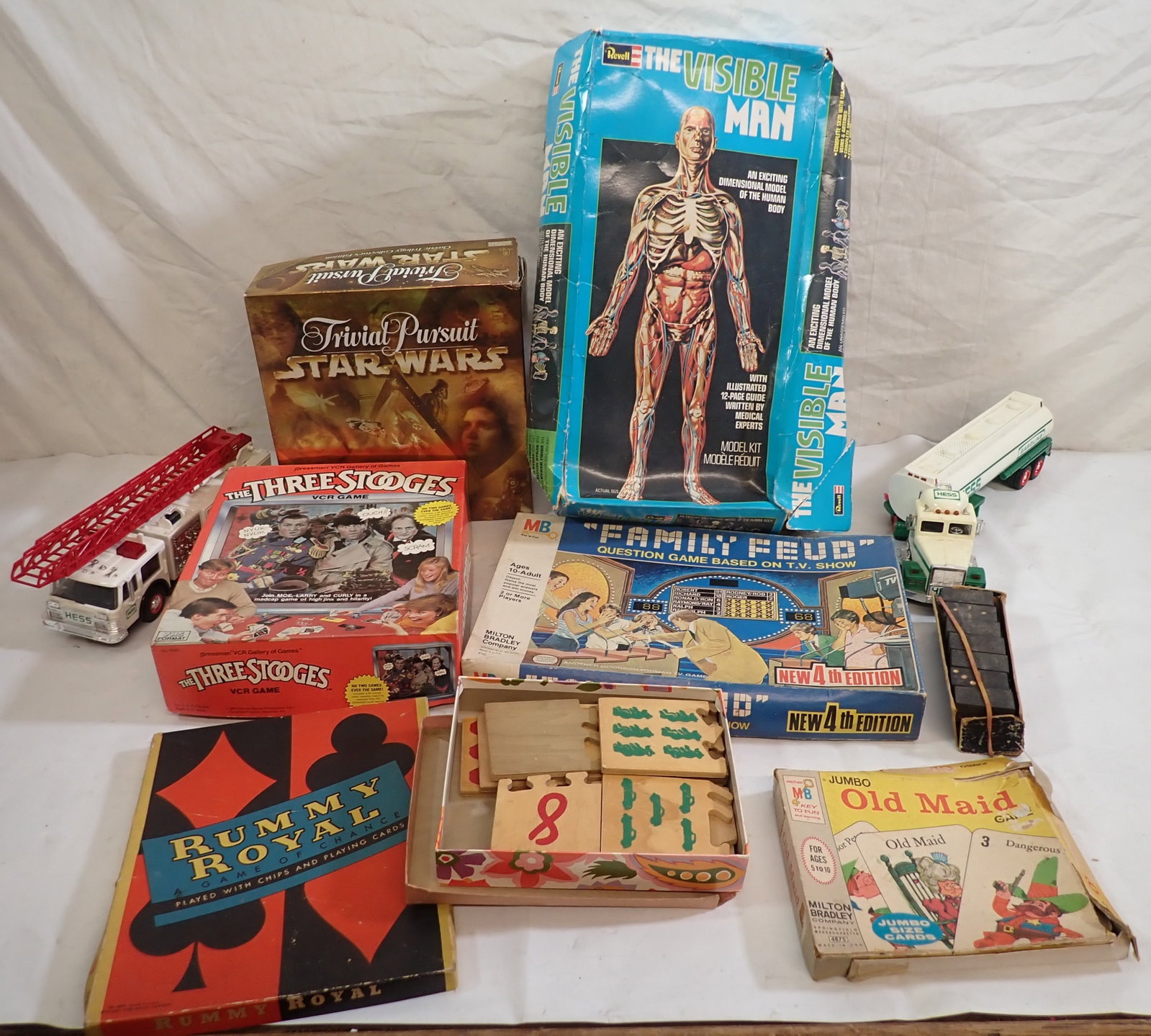 Invisible Man Games & Hess Trucks: We do not guarantee they are complete. Sold as pictured. No in house shipping !