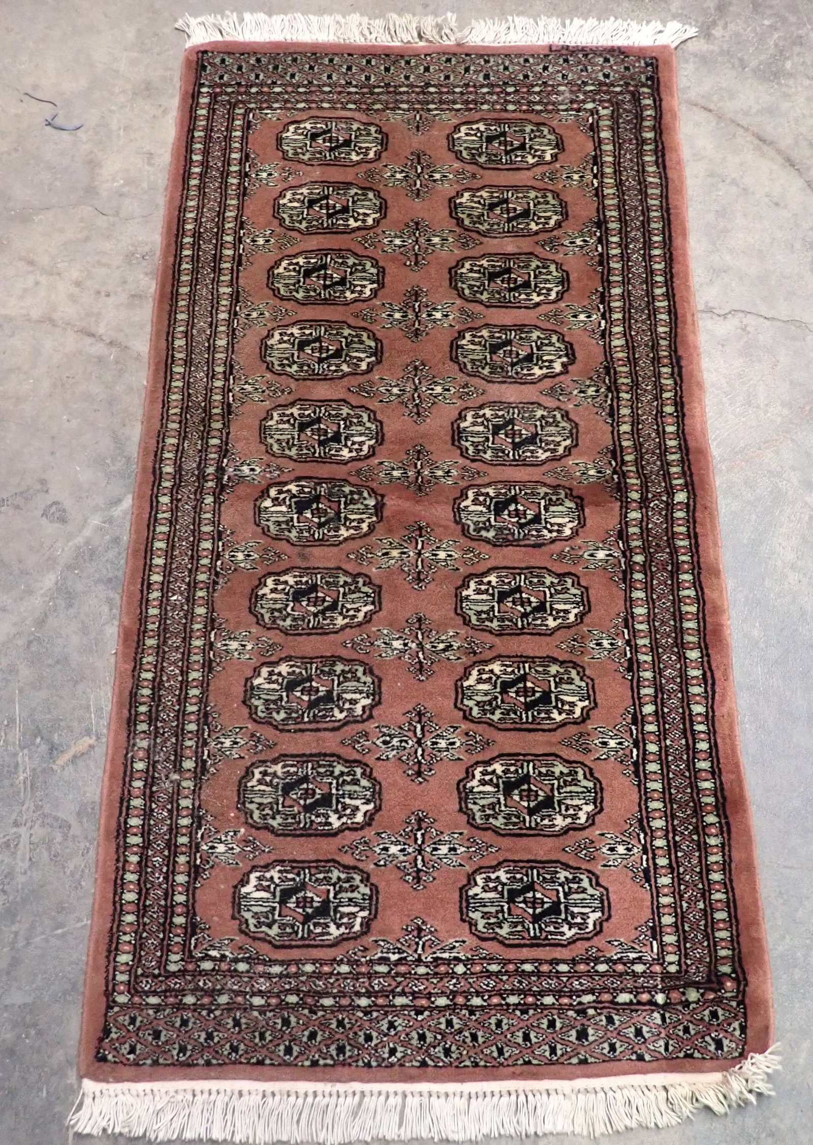 Oriental Area Rug: Approx 26" x 50". Shipping available