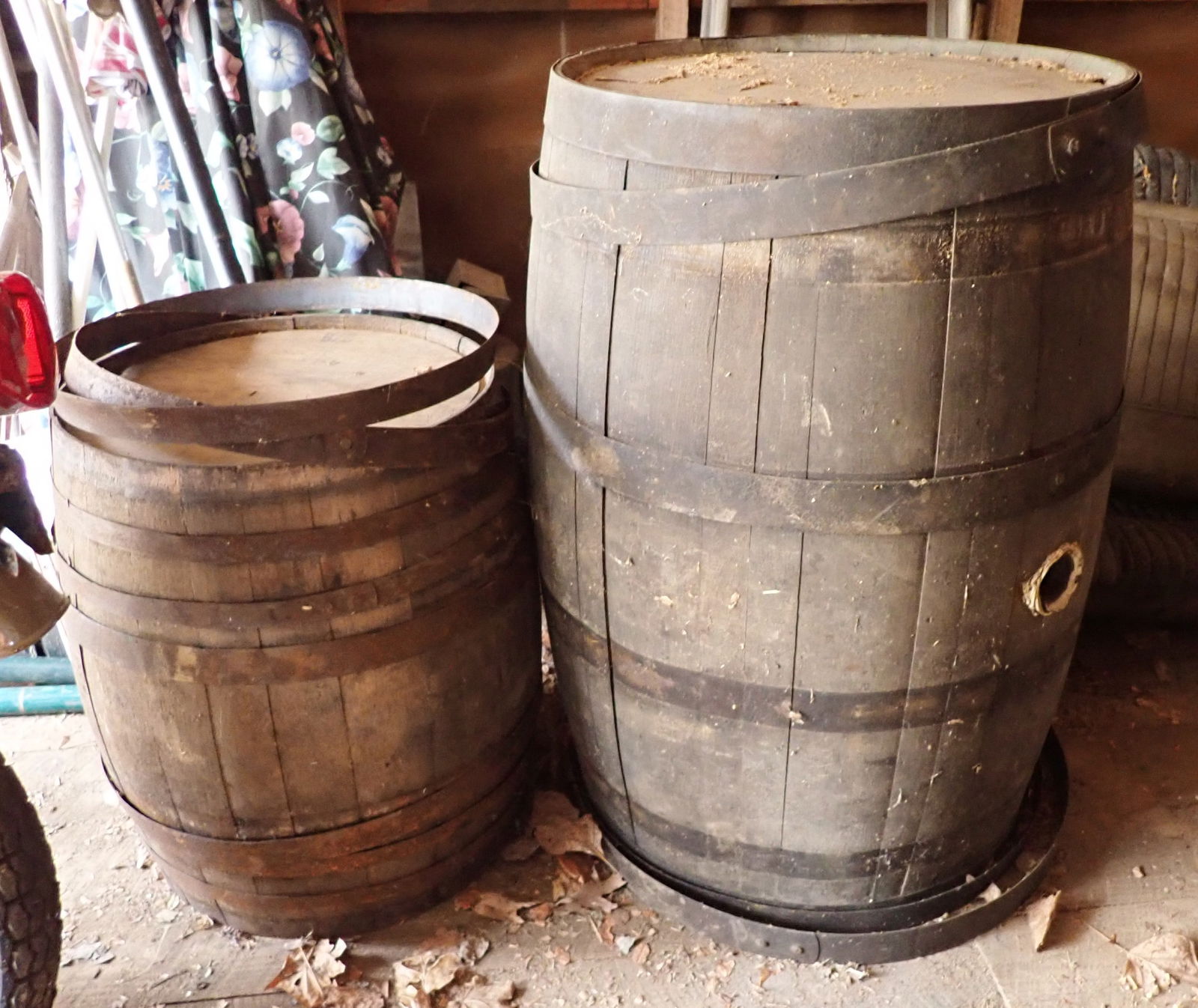 2 Wooden Kegs: Largest is apprx 23" in diameter and 34 3/4" tall. No in house shipping ! Bring help to load