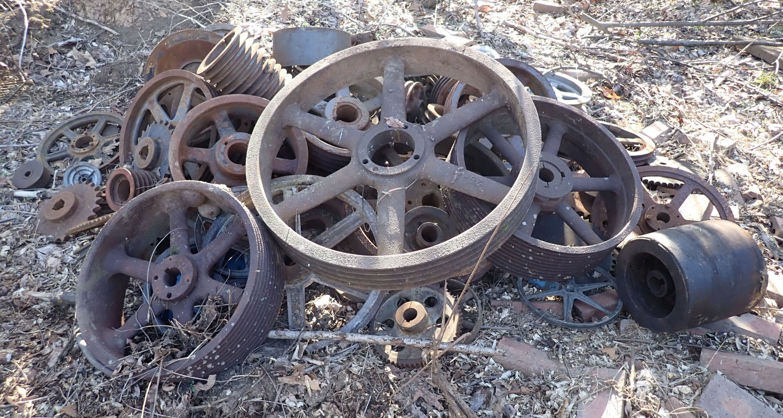 Pulleys Sprockets Wheels: Largest is approx 4 3/8" wide and 30 3/4" in diameter. No in house shipping