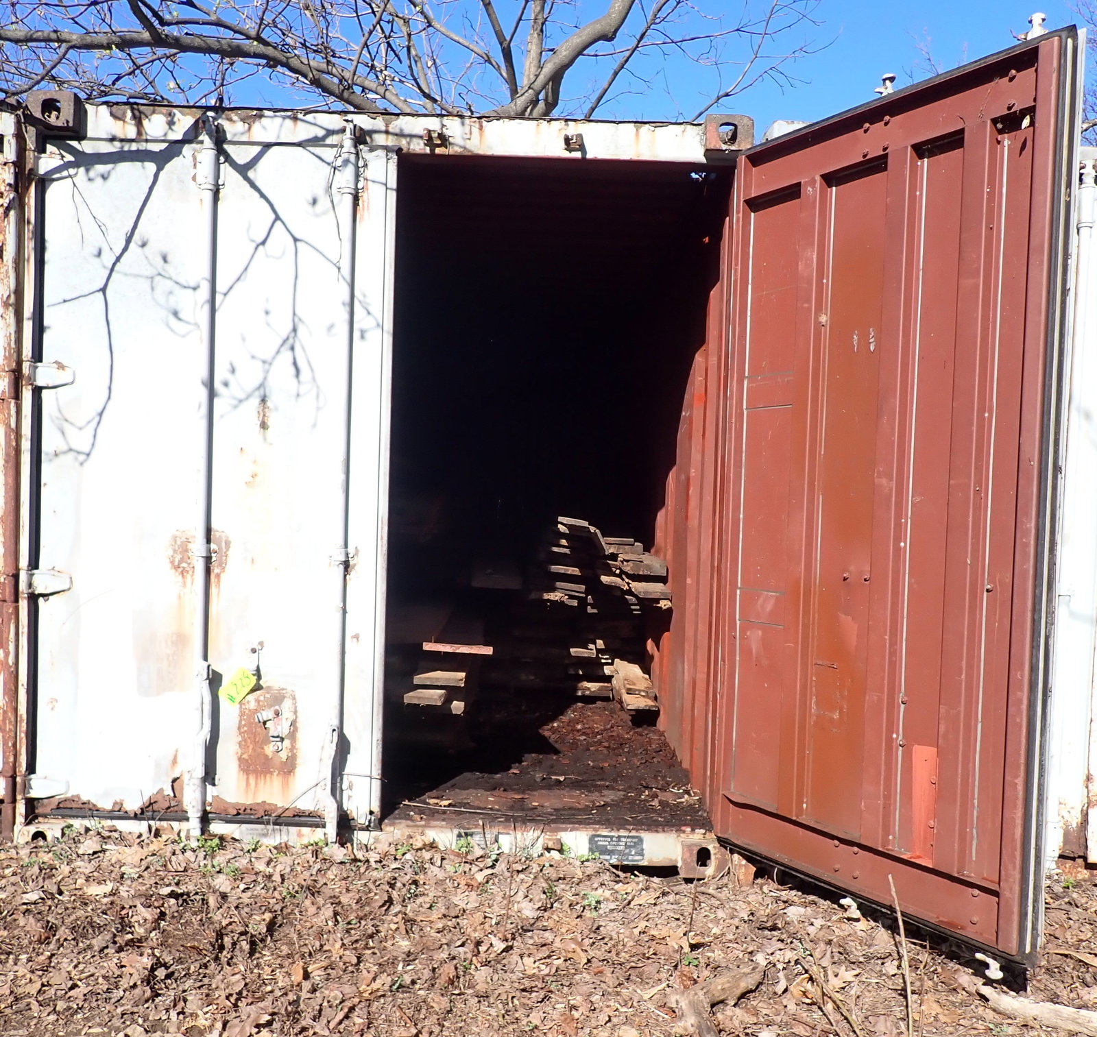 20' Shipping Container: This lot is for container only ! Does not include lumber. If lumber does not sell or if buyer of lumber leaves any, it will be included with the container. No in house shipping !