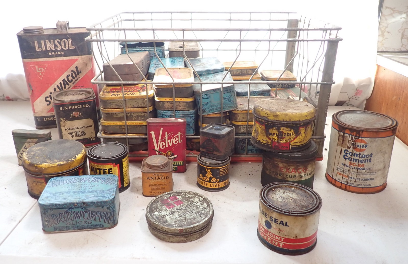 Pennzoil Gulf Velvet & Misc Tins: Crate is also included. Most of them in the crate have writing on them and are filled with hardware. No in house shipping