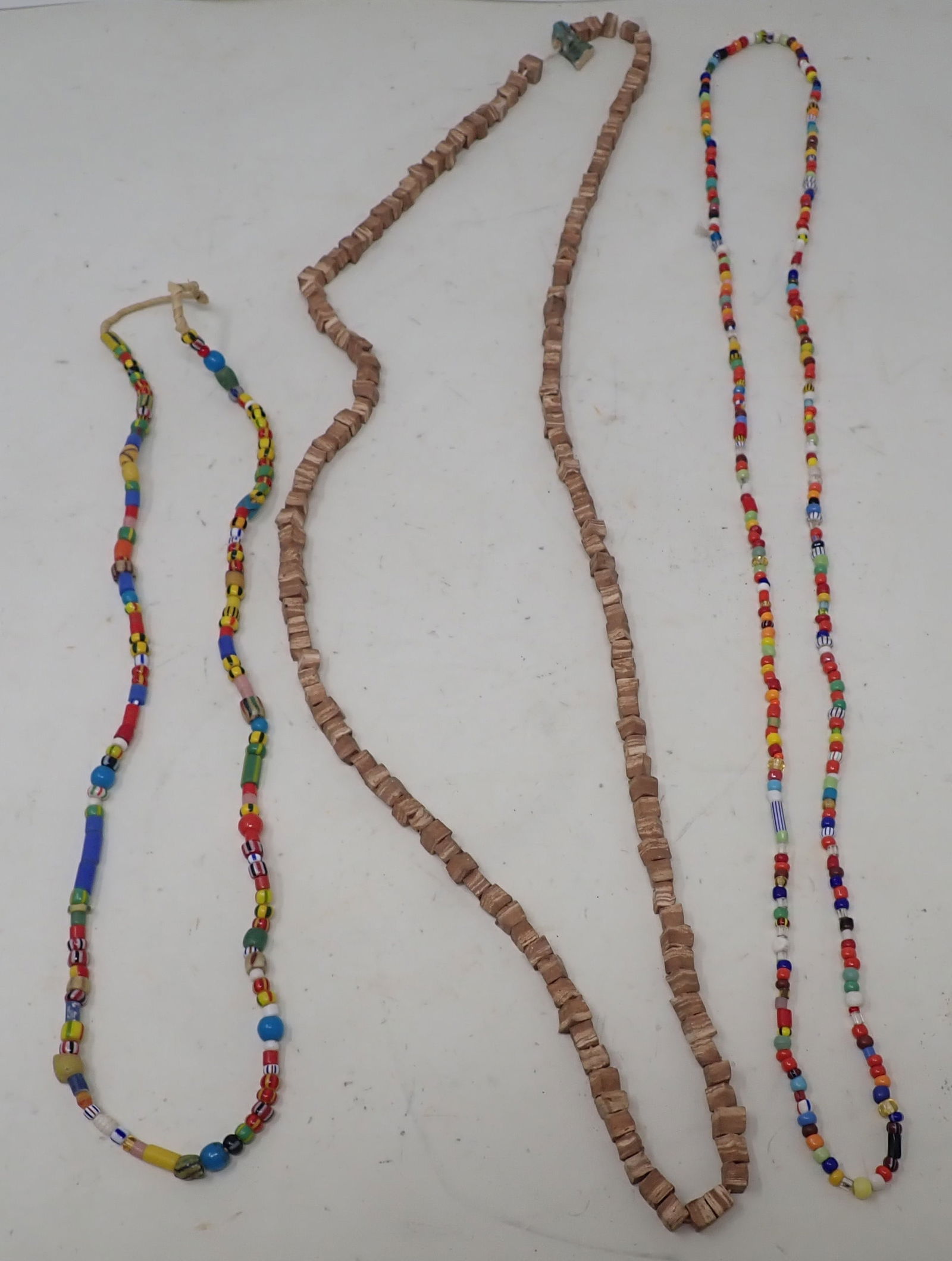 African Necklaces: Longest is approx 19 3/4" ( as pictured). Shipping available