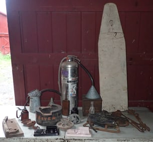 Oil Cans Funnels & Misc Table Contents