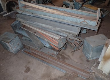 Pile of Chicken Feeders