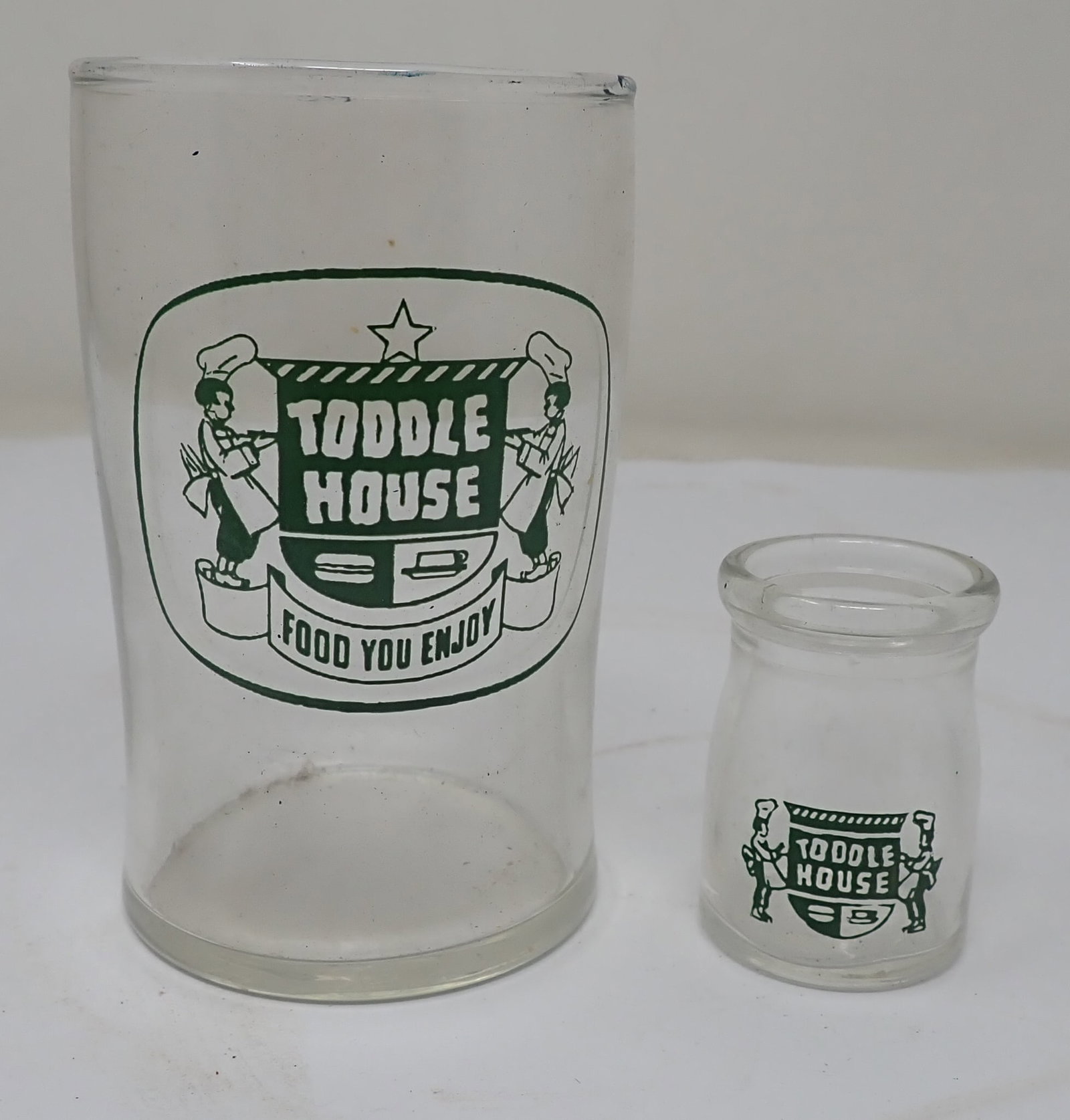 Toddle House Cup & Creamer: Cup is apprx 2 1/2" in diameter and 4 1/8" tall. Shipping available