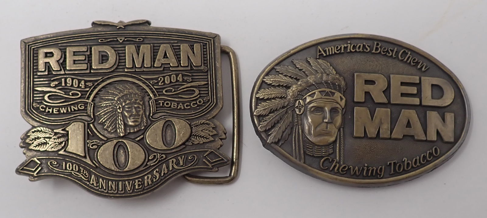 2 Red Man Chewing Tobacco Belt Buckles: Left one is approx 2 1/2" x 2 5/8". Shipping available
