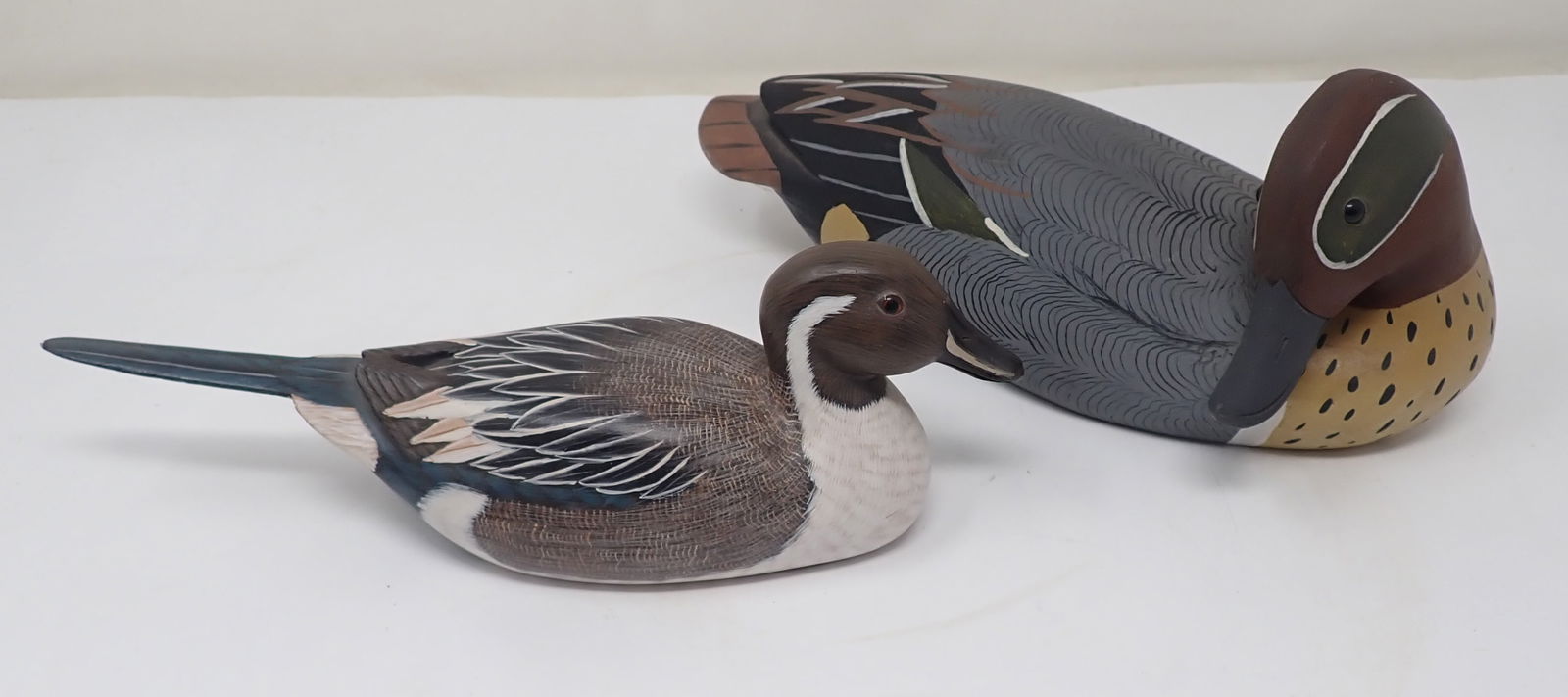 2 Duck Decoys: Largest is apprx 9 1/2" long. Shipping available