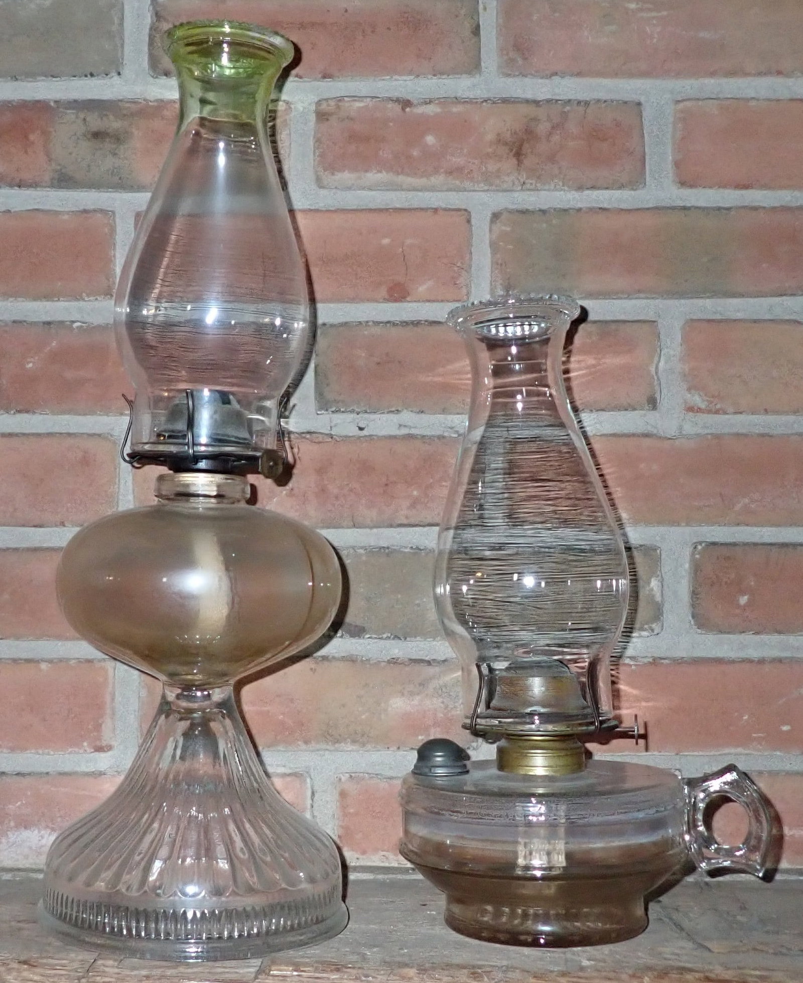 2 Oil Lamps: Tallest is apprx 18" tall. Shipping available ($20 handling charge, plus postage)