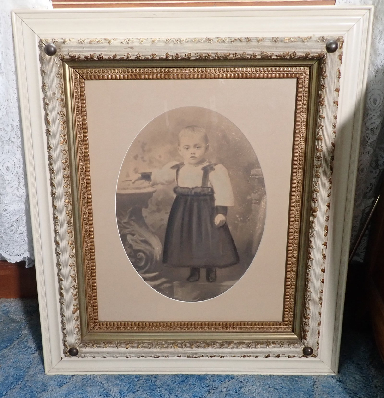 Framed Portrait of Child: Apprx 25" x 29 1/2". Shipping available ($40 handling charge, plus postage)