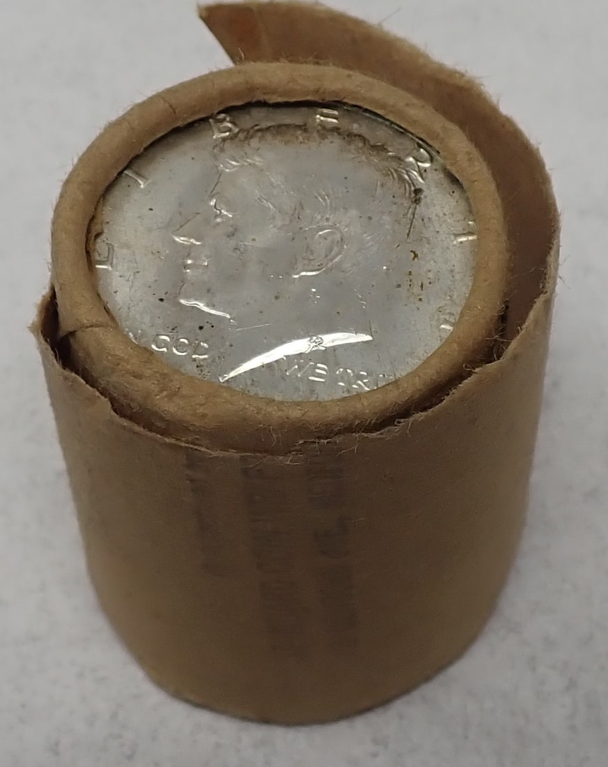1965 Kennedy Half Clad Bank Roll: Weighs approx 8.2 oz. Shipping available