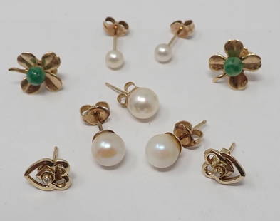 Earrings: 14K yellow gold including two pair of pearl studs, one pearl single; pair of clovers with green jade bead; and a pair of double heart studs with diamond accent, 2.97 dwt total.