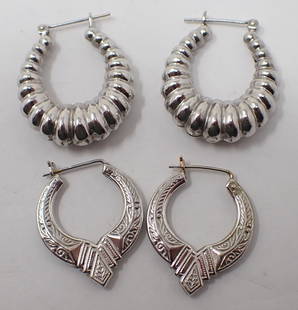 2 Pair of Gold Hoop Earrings: 14K white gold: hollow construction, 3.71 dwt total.
