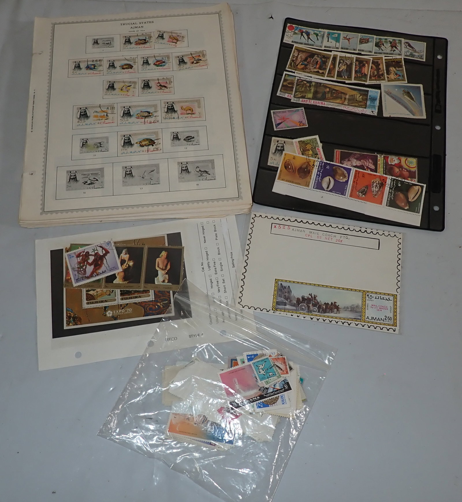 Trucial States Ajman Ras Al Khaima & Misc Stamps: There maybe some more not pictured in catalog. Shipping available