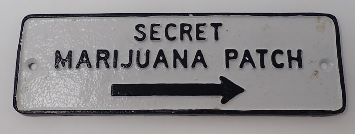 Cast Iron Secret Marijuana Patch Sign