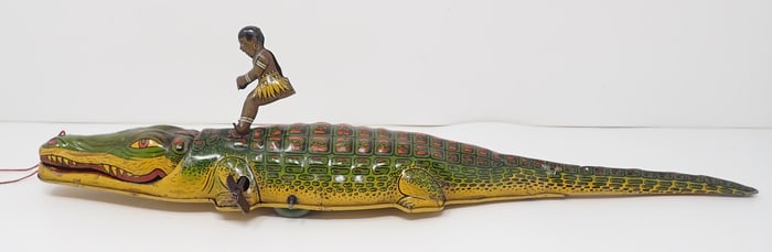 Native Boy Riding An Alligator Wind Up Toy