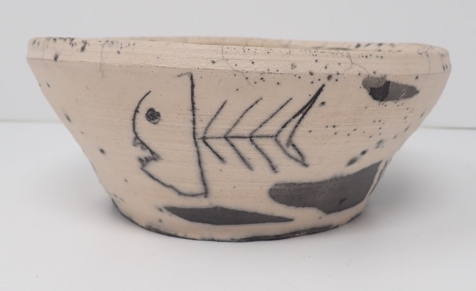 2009 Signed Pottery Fish Heads Bowl: Approx 7 1/4" in diameter and 3" tall. Shipping available
