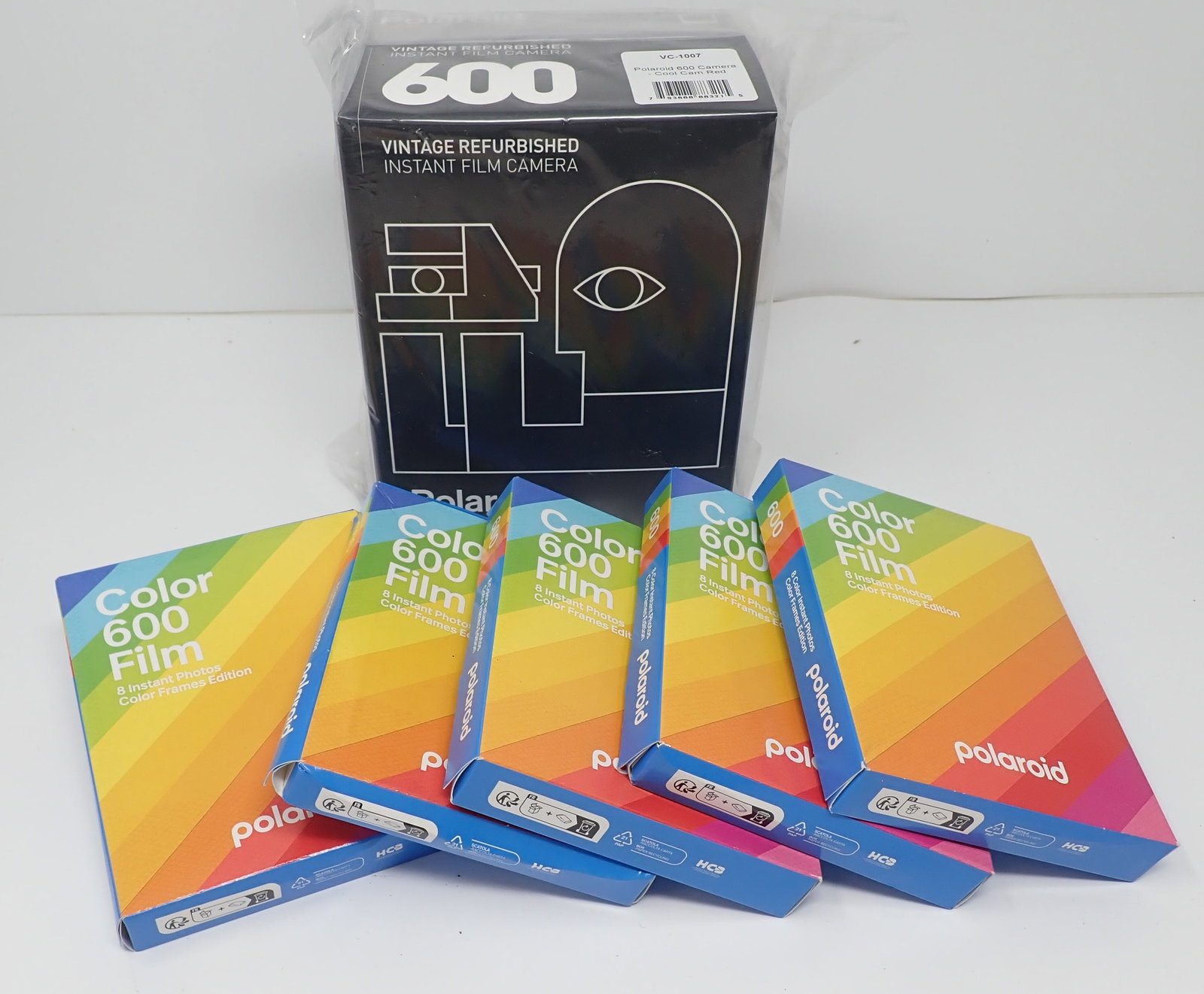 Polaroid 600 Vintage 600 Camera Cool Cam Red: Refurbished instant film camera by Retrospekt , Cool Cam Red. Camera is still sealed in plastic. Also comes with film. Shipping available