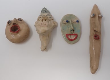 Pottery Grotesque Face Sculptures