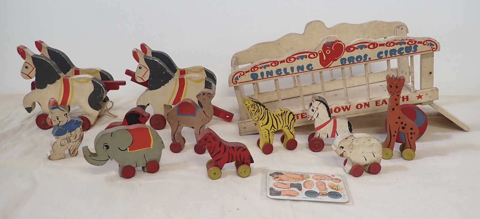 Toy Craft Ringling Bros. Circus Horse Drawn Wagon: Horse Drawn Wooden Wagon and animals . Wagon is approx 9 3/4" wide and 18" long. Shipping is available($25 handling charge, plus postage).