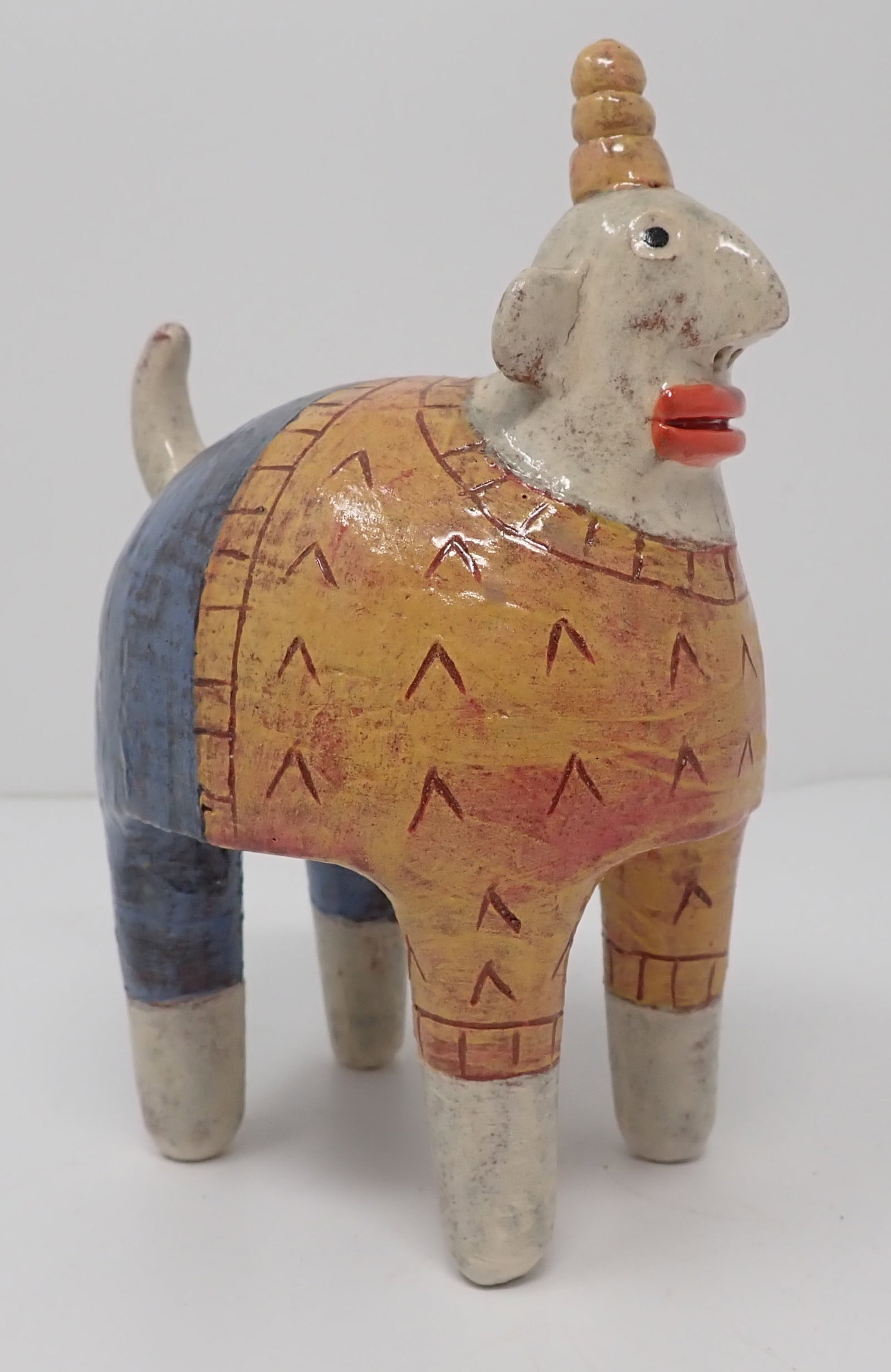 Kim Murton Ceramic Art Sculpture: Approx 4" long and 6 1/4" tall. Shipping available