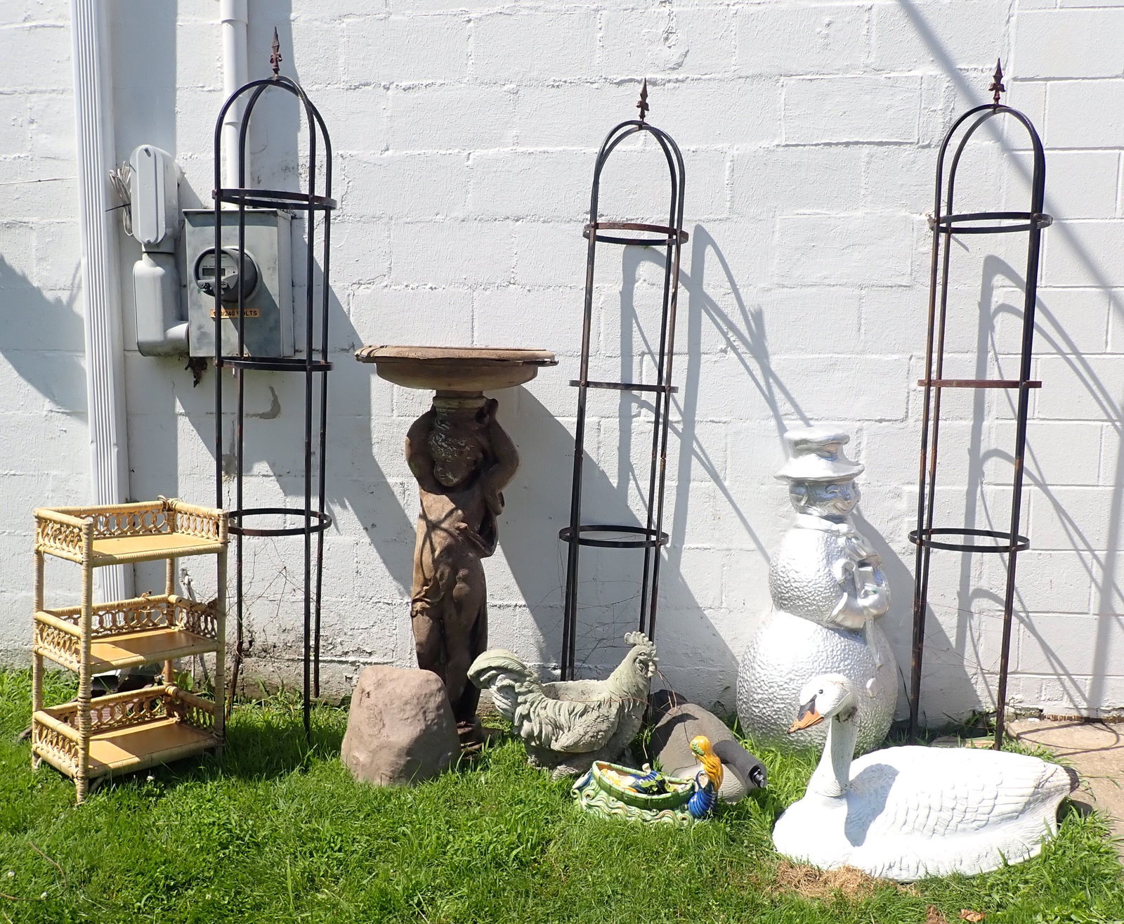 Trellis's , Planter , Plastic Swan & Misc: Trellis's are approx 80" tall. Must take all. No in house shipping !