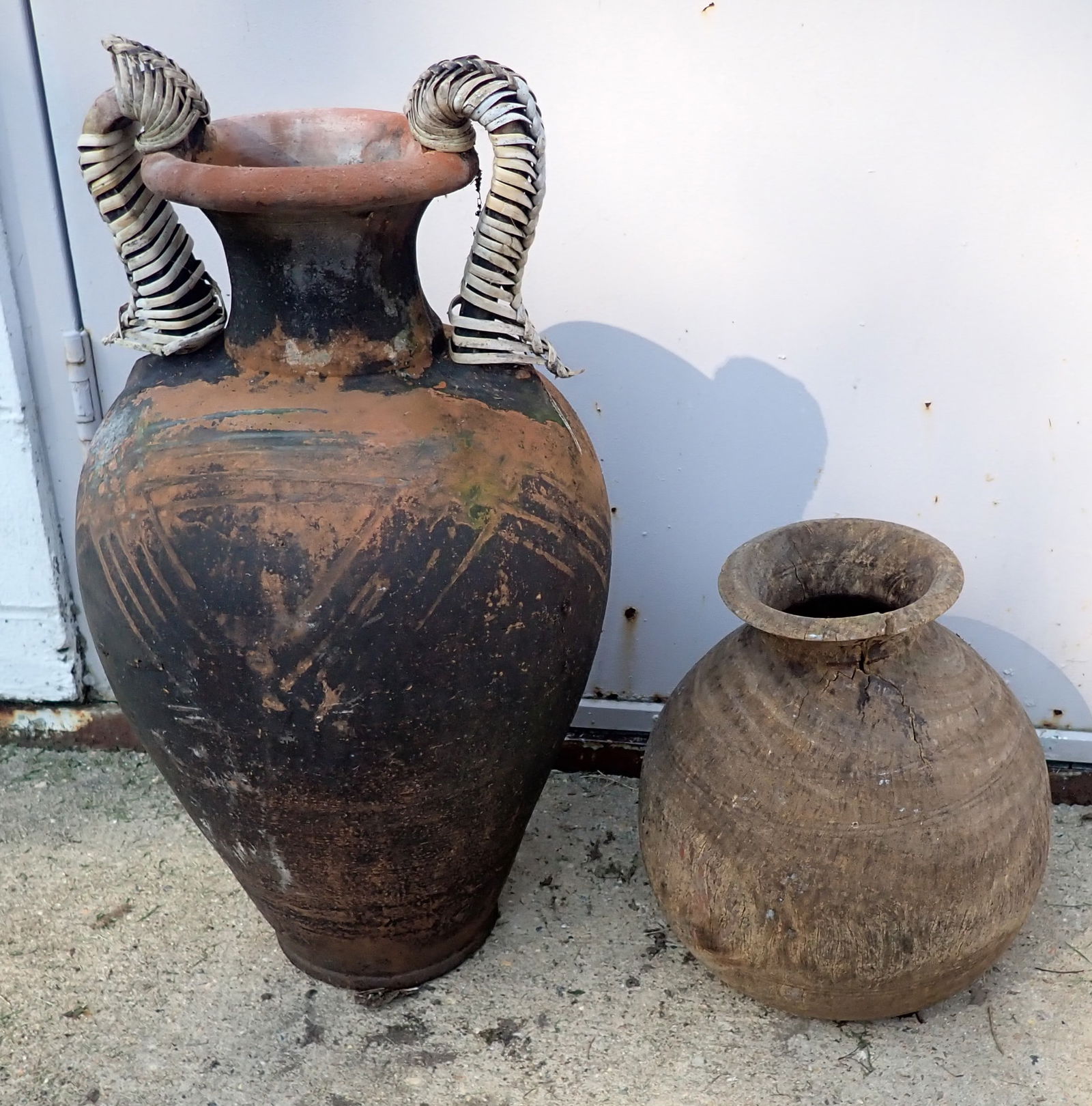 Clay Urn & Wooden Planter: Urn is apprx 14" in diameter and 26 1/2" tall. No in house shipping !