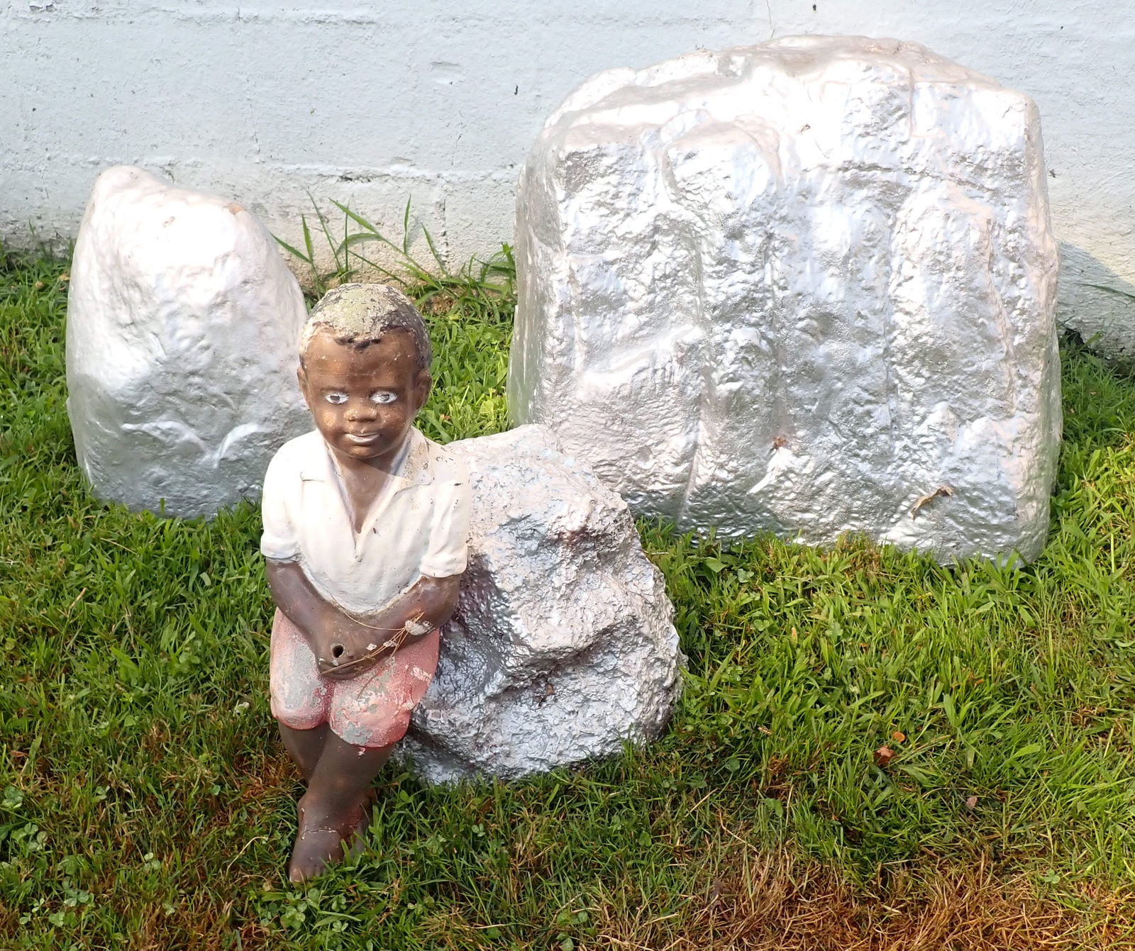 Resin Rocks & Concrete Fisherman: Largest rock is apprx 15" X 21" x 21". No in house shipping