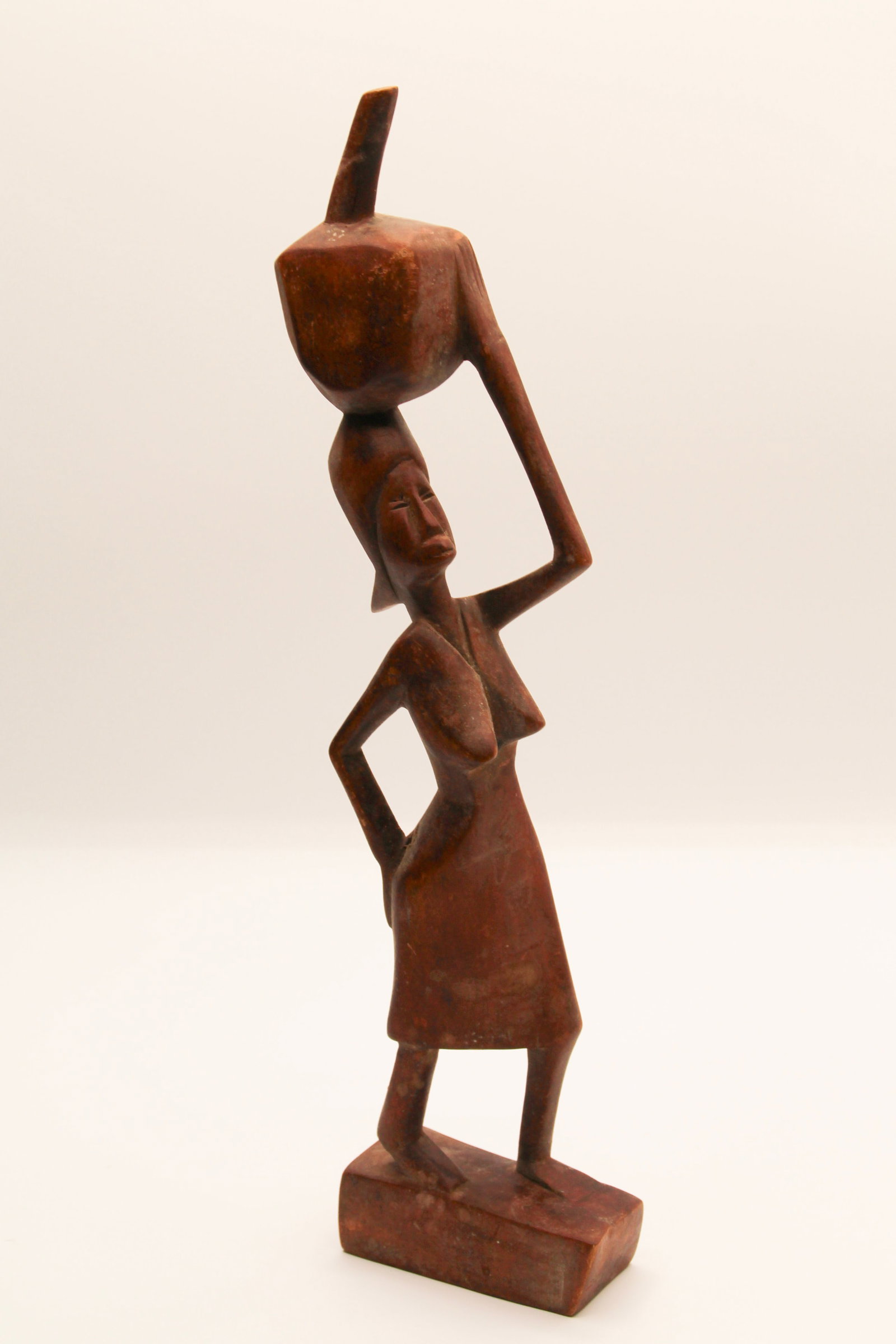 African Woman Carrying A Vessel: Approx 12 1/2" tall. Shipping available