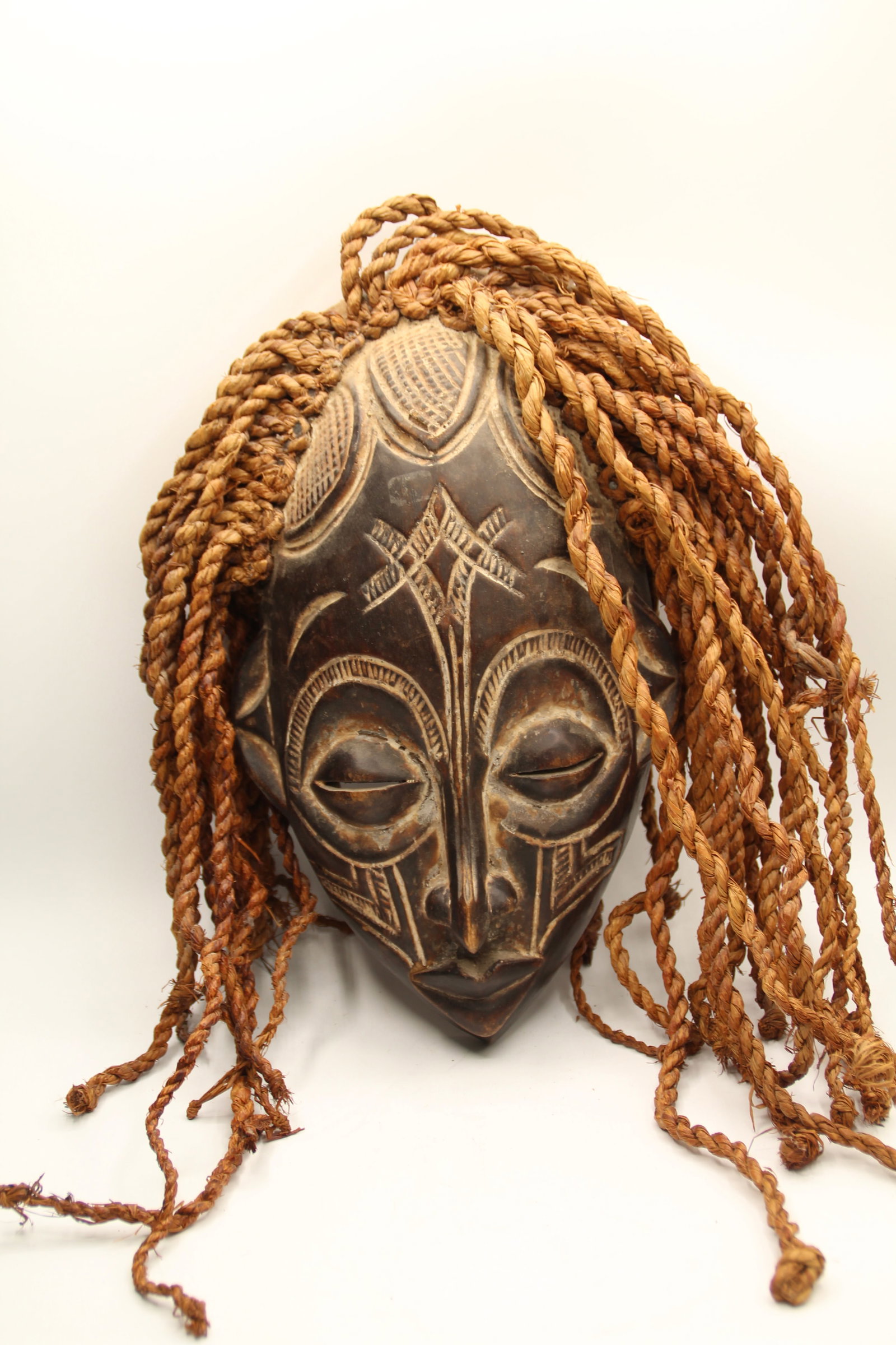 Chokwe Guro Wood Carved Mask: Approx 8 1/4" x 13 5/8". Shipping available