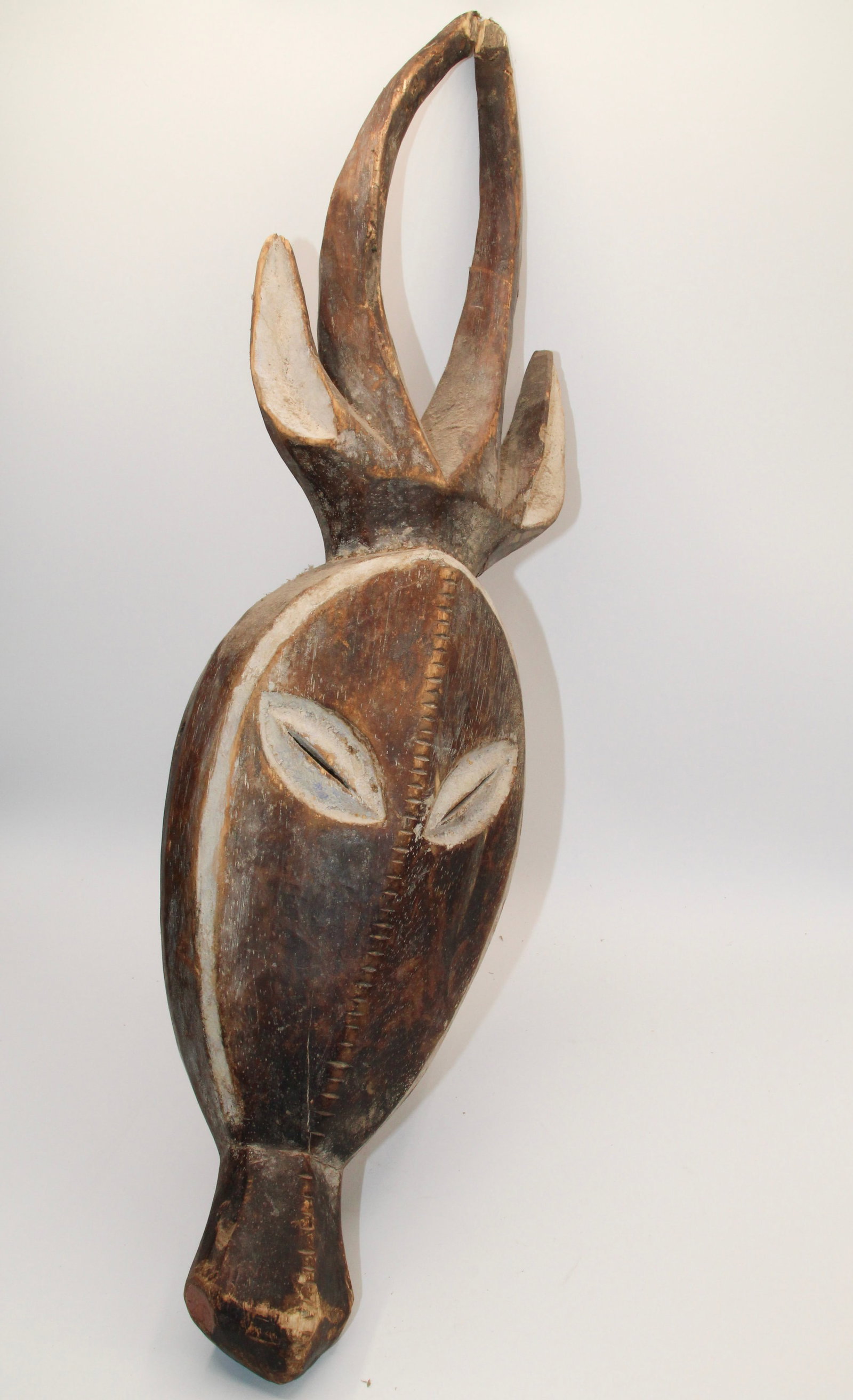 Kwele Gabon Mask: Approx 6" x 24 1/2". Shipping available ($30 handling charge, plus postage)