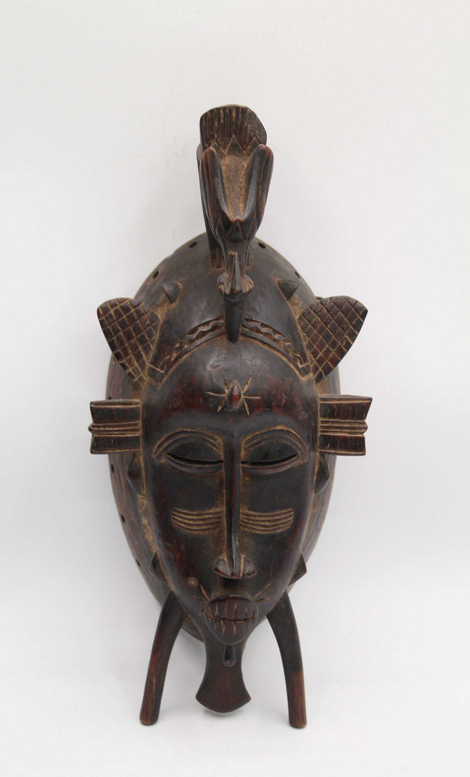 Kpelye Ebony Mask: Approx 4 3/4" x 12 1/4". Shipping available