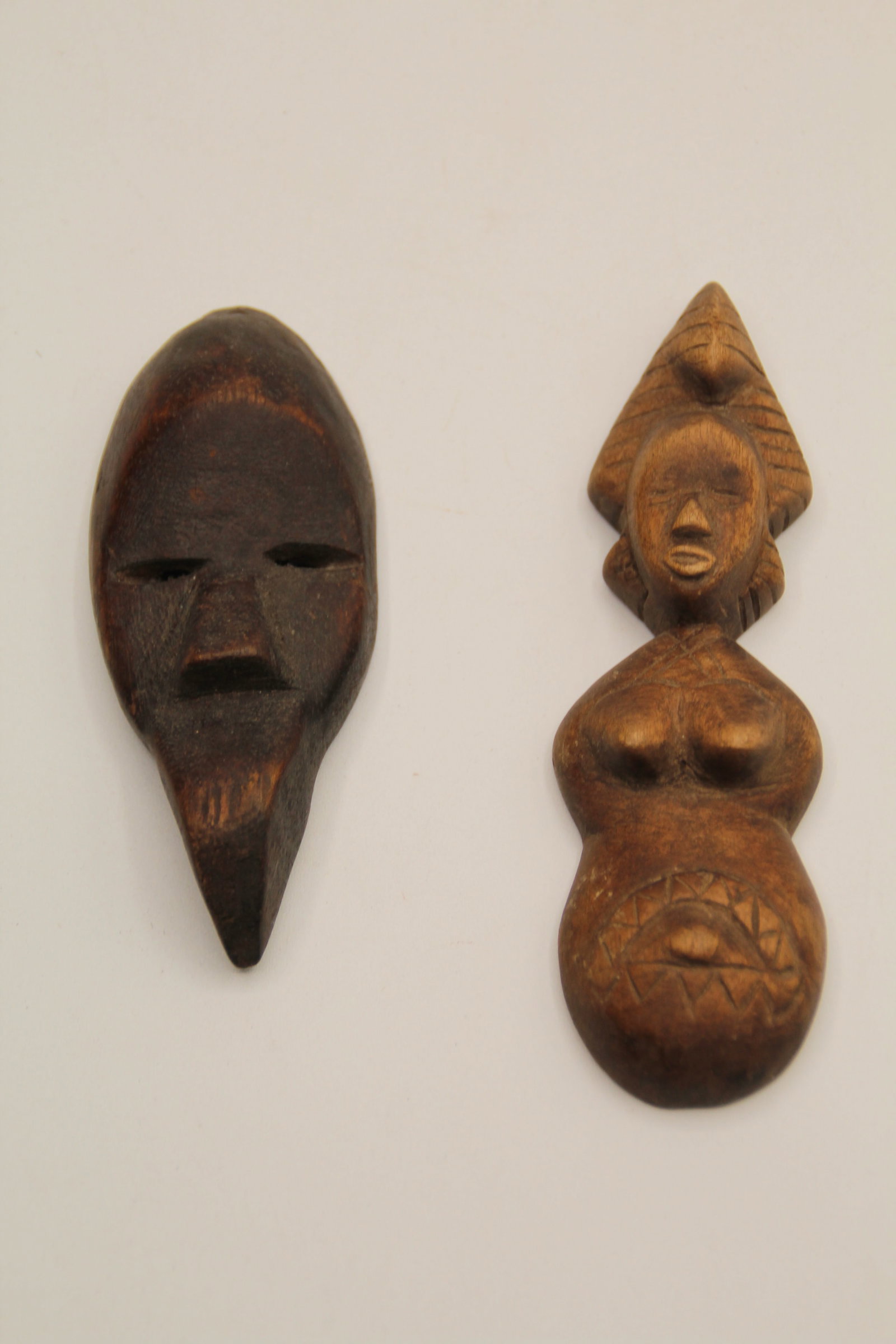 African Carved Passport Mask & Figure: Longest is approx 5 3/8". Shipping available