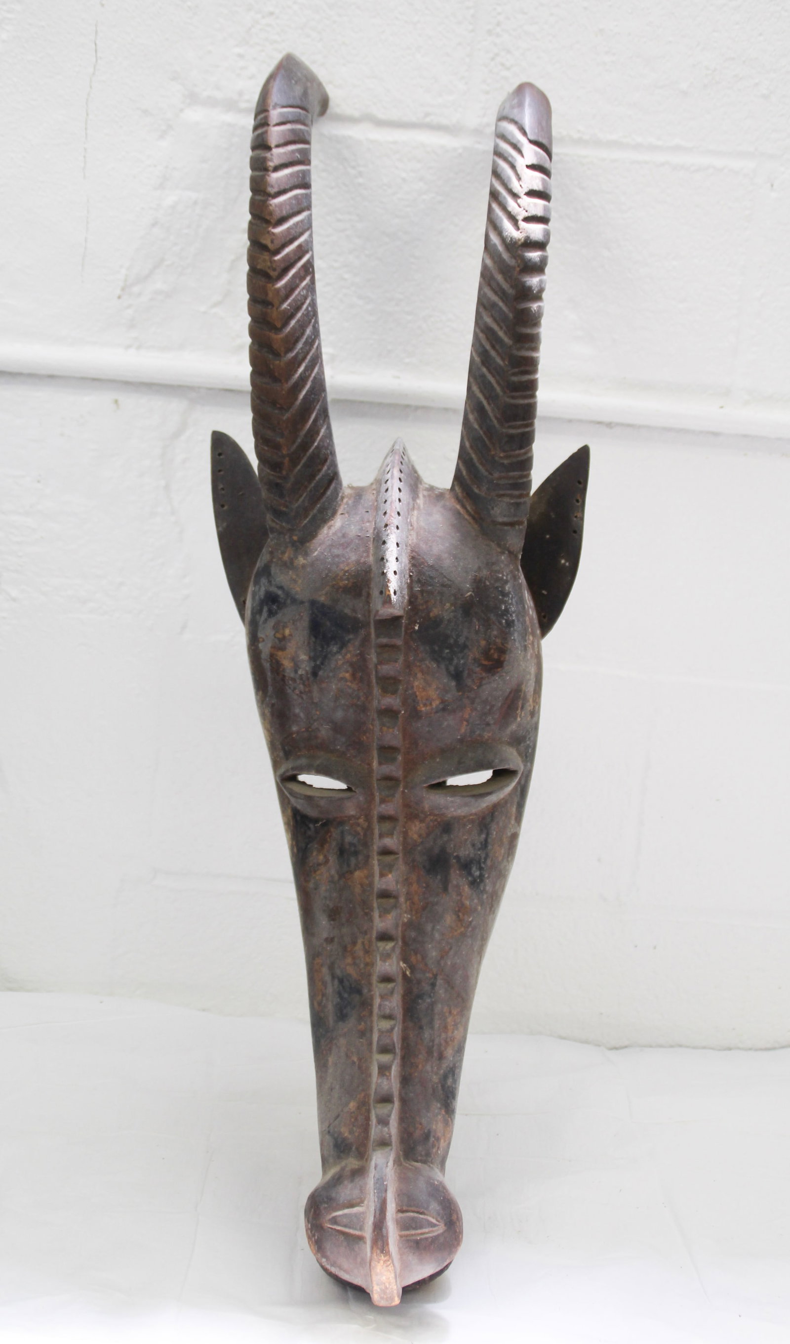 African Antelope Mask: Approx 11" x 34". Shipping available thru UPS Store 5528. Email store5528@theupsstore.com to get a quote BEFORE bidding ! There are no refunds because of shipping prices